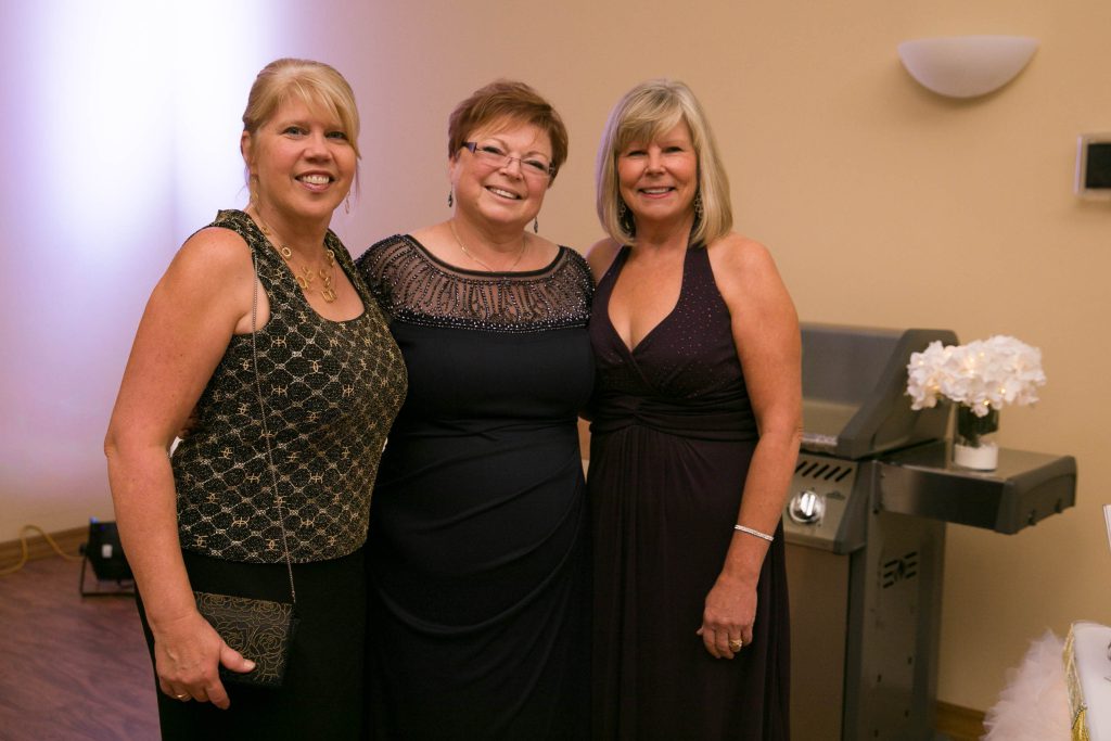 Three NOFCC volunteers at the Gold Soirée