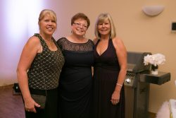 Three NOFCC volunteers at the Gold Soirée